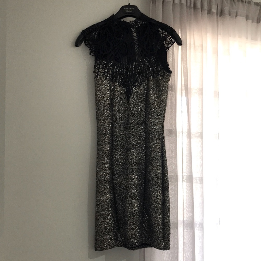 PROGRESS mini dress. NEW!! Never used!